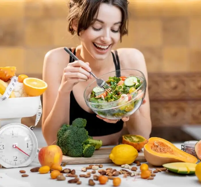 Fresh fruit and vegetables alongside a prepared salad, the fibre-rich diet SodaTide is designed to complement